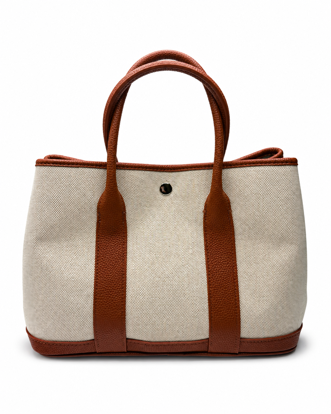 A structured tote bag featuring a cream-colored canvas body with vertical brown leather straps and matching brown leather trim, including the double top handles and base, set against a plain white background.