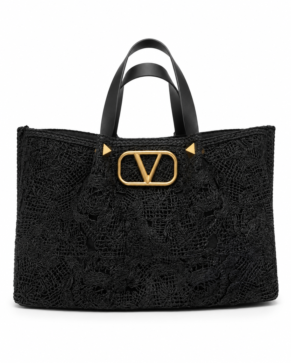 A black textured tote bag with a prominent gold-tone V logo clasp on the front, dual black leather top handles, and small gold pyramid studs on either side, set against a plain white background.