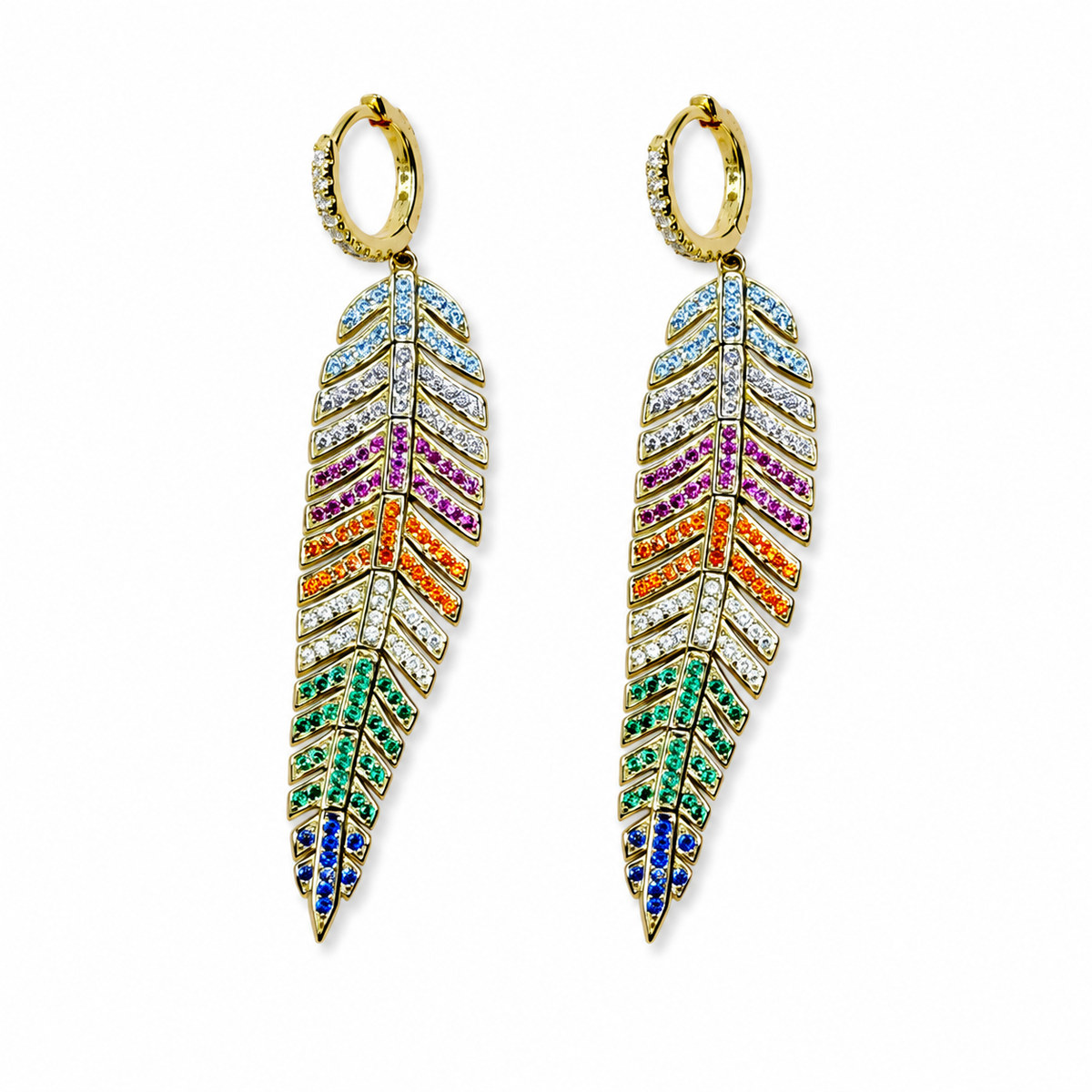 Pair of statement earrings with multicolored feathers and gold-tone hooks, on a white background